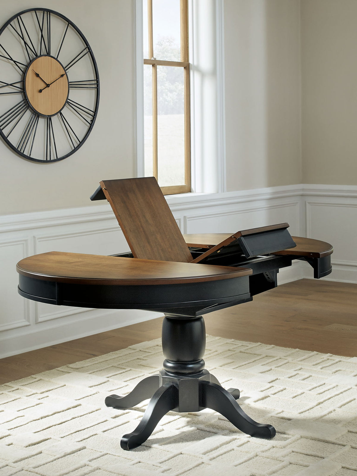 Clorazi - Oval Dining Room Butterfly Extension Table - Black / Brown